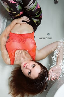 #422 - Wetlook by Active Girl in Sports Leggings, bright Bodysuit and Socks get Soaking Wet in Bath