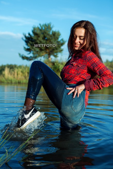 wet girl get wet jeans t-shirt tights shirt sneakers fully soaked water bath swim