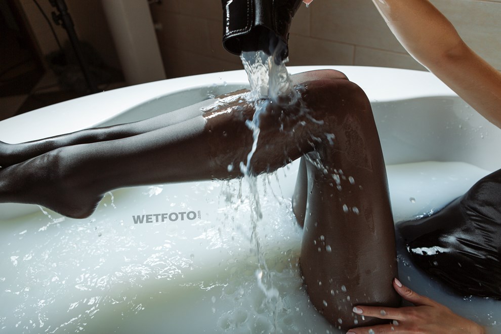 wetfoto wetlook sexy girl takes a milk bath fully clothed