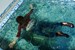 wetfoto wetlook underwater diving fully clothed girl skinny jeans