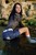 wet girl get wet wet hair swim fully clothed blouse denim shorts boots leather sea