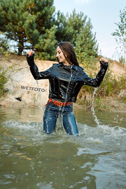 wetfoto girl fully clothed get wet swim blue jeans