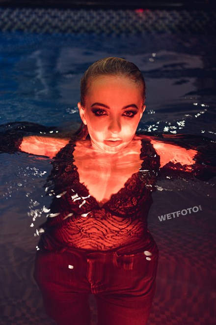 hot blonde swims pool takes shower in skinny jeans wetfoto