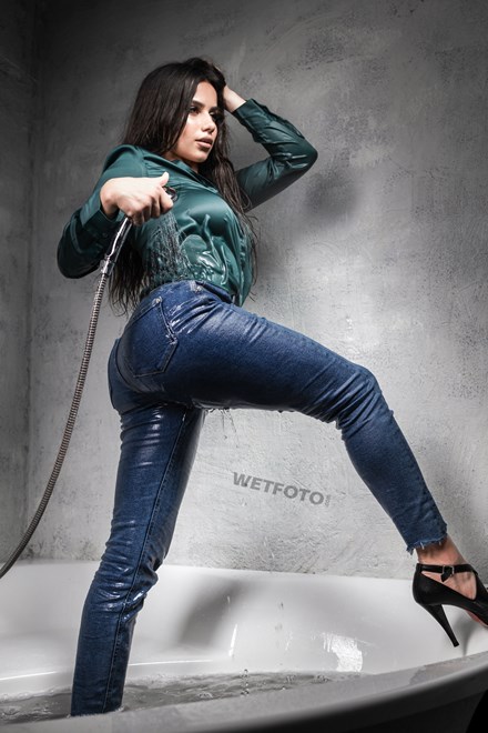 hot girl takes bath jeans shirt wetfoto wetlook
