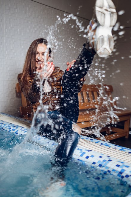 sexy woman swims fully clothed jacuzzi wetfoto