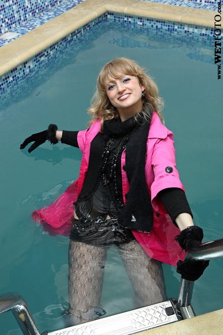 wet woman get wet fully clothed coat stockings blouse shorts scarf gloves boots leather pool
