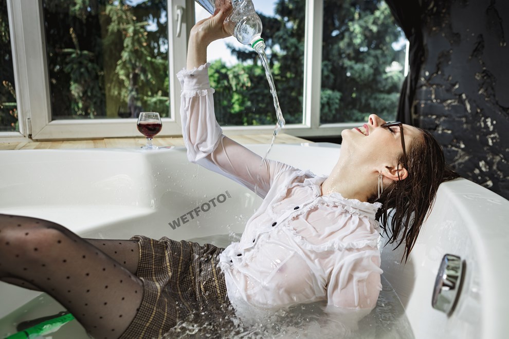 wetfoto girl business attire nylons skirt takes bath shampoos hair