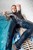 wetfoto fully dressed girl skinny jeans swims in the pool
