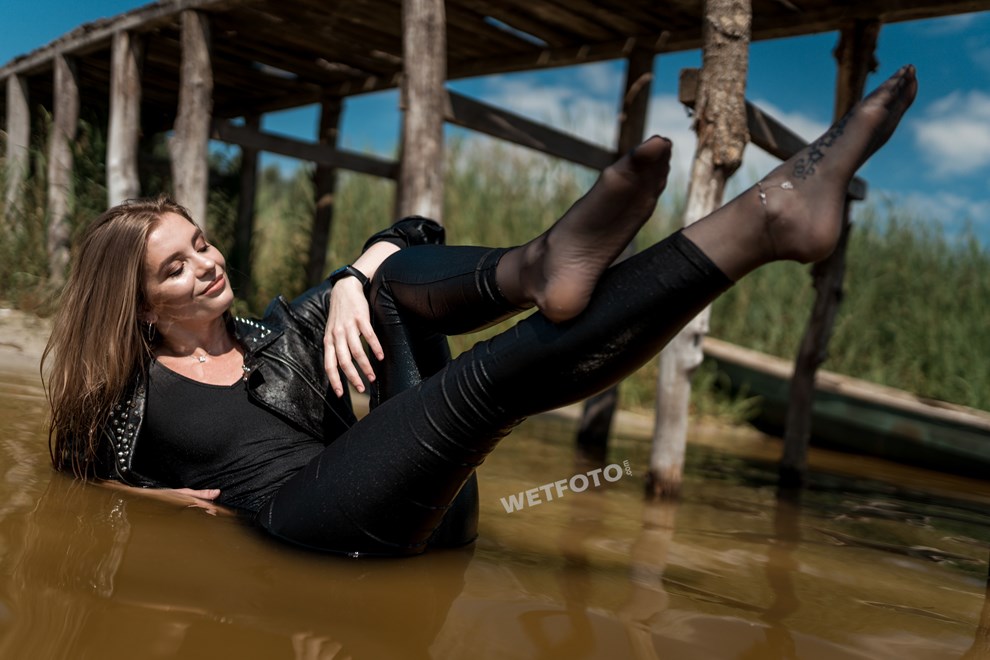 wetfoto wet fully clothed girl skinny jeans bodysuit