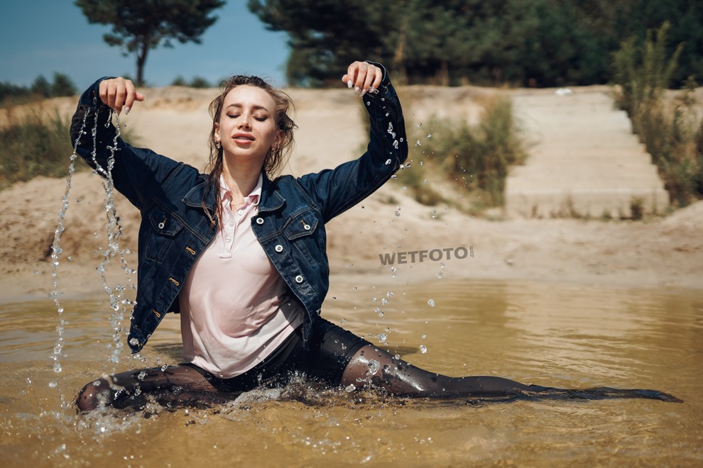 girl get wet her clothing at lake wetfoto