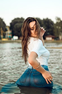 #567 - Sexy Girl Swims and Get Wet in Skinny Jeans, Socks and White T-shirt without Bra