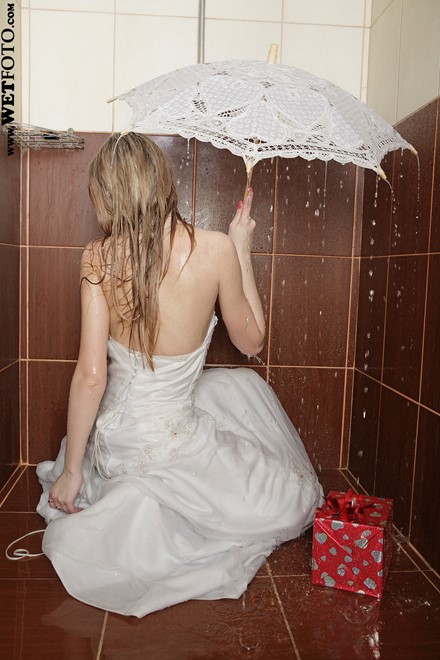 wet girl get wet wet hair fully clothed wedding dress stockings leather boots umbrella bath shower