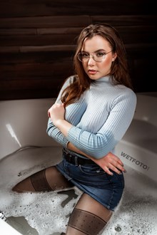 #592 - Girl in Glasses Takes a Bath and Gets Wet in Jeans Skirt, Pantyhose and Sneakers
