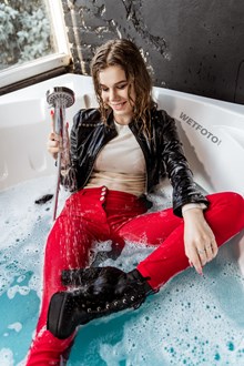 #612 - Hot Girl Takes a Bath in Red Pants and Gets Completely Wet