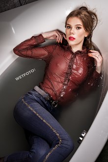 #650 - Fully Clothed Girl Gets Wet in the Bath