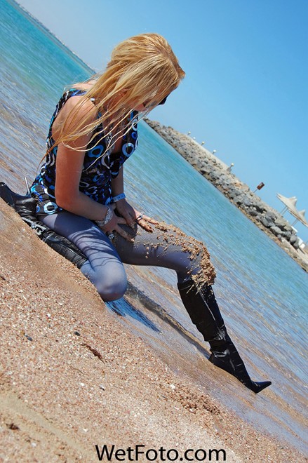 wet girl get wet wet hair fully clothed dress stockings boots sea