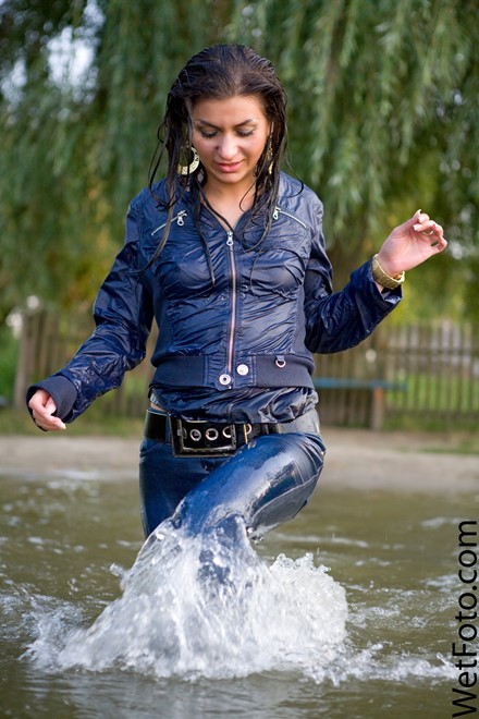 wet girl get wet fully clothed jacket jeans t-shirt high heels shoes lake