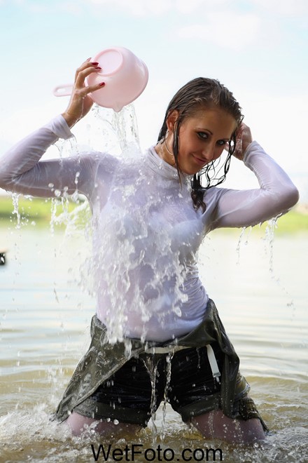 wet girl get wet wet hair swim fully clothed leggings blouse shorts denim high heels lake